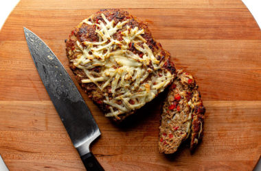 chili meatloaf on a cutting board