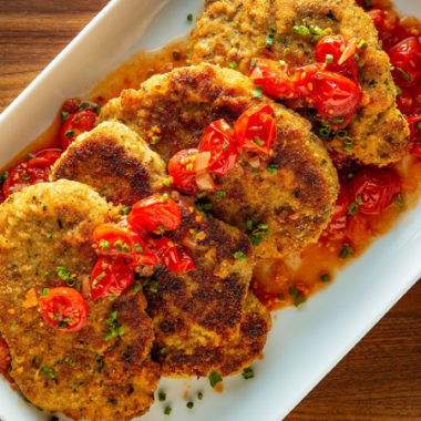 breaded porkchop on a plate