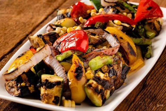 grilled veggies on a white tray