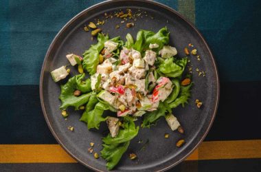 tarragon and apple chicken salad on a bed of greens