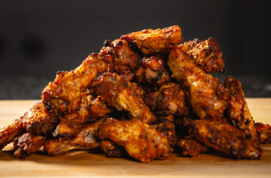 a pile of buffalo chicken wings