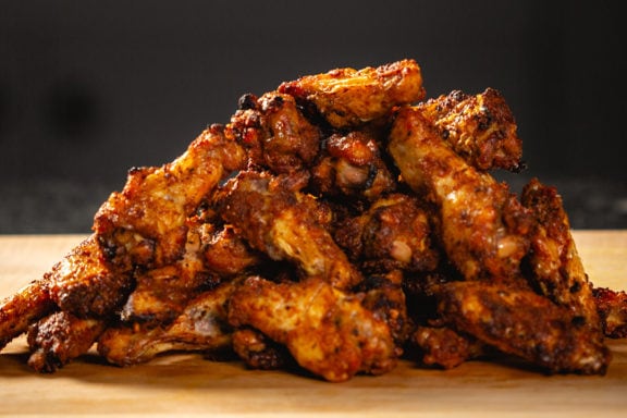 a pile of buffalo chicken wings