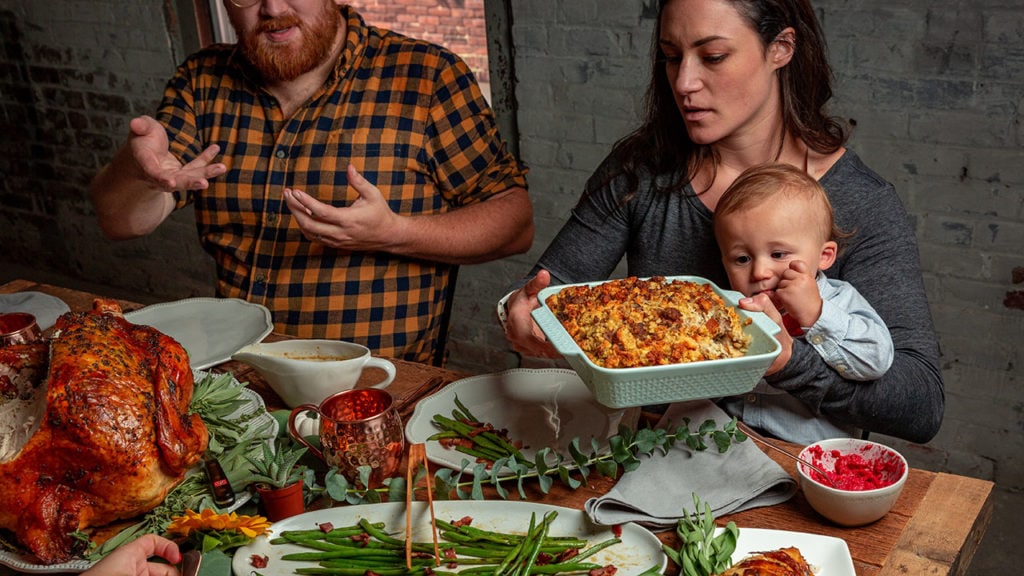 a family sharing thanksgiving turkey