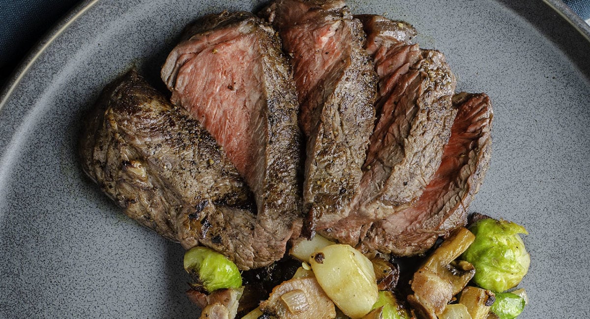 top sirloin steak with bacon and brussels sprout hash