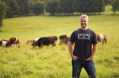 butcherbox founder mike salguero in a field