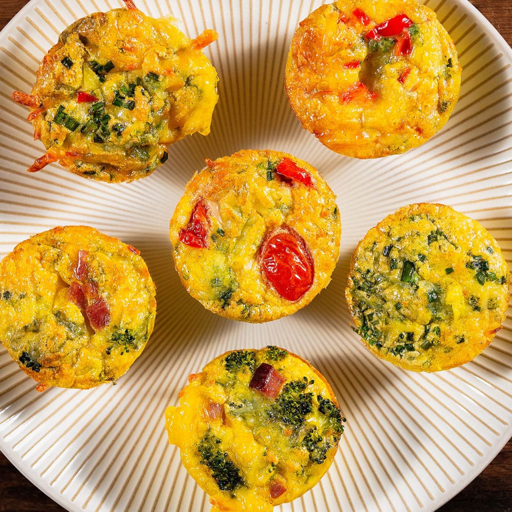 a variety of individual frittatas
