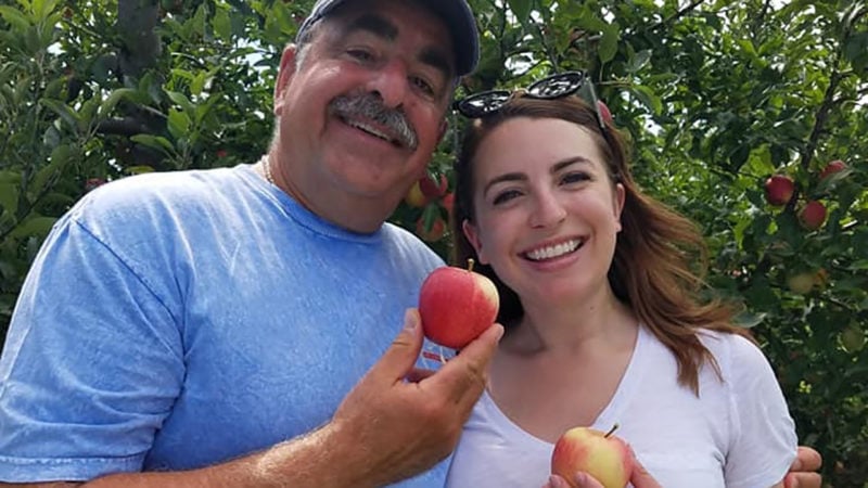 the author and dad eating apples