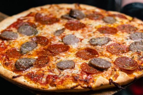 sausage pizza on the grill