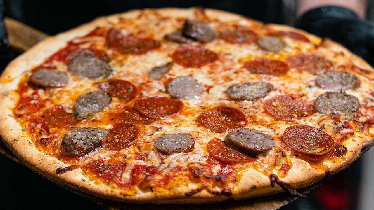 sausage pizza on the grill