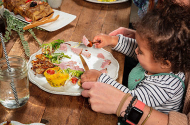 toddler eating frittata