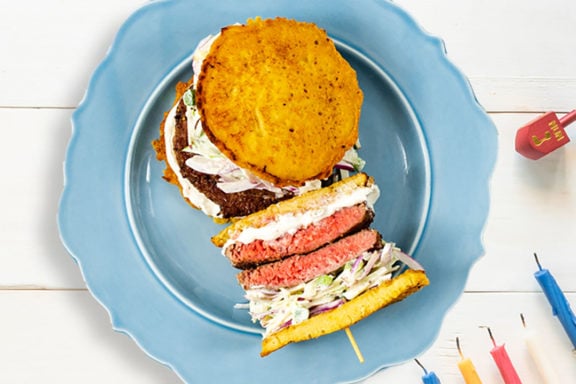 latke burger on blue plate