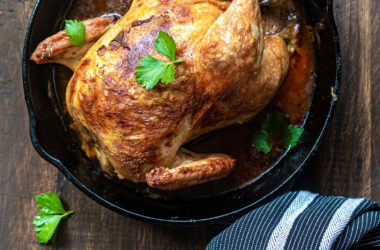 whole chicken in a cast-iron pan