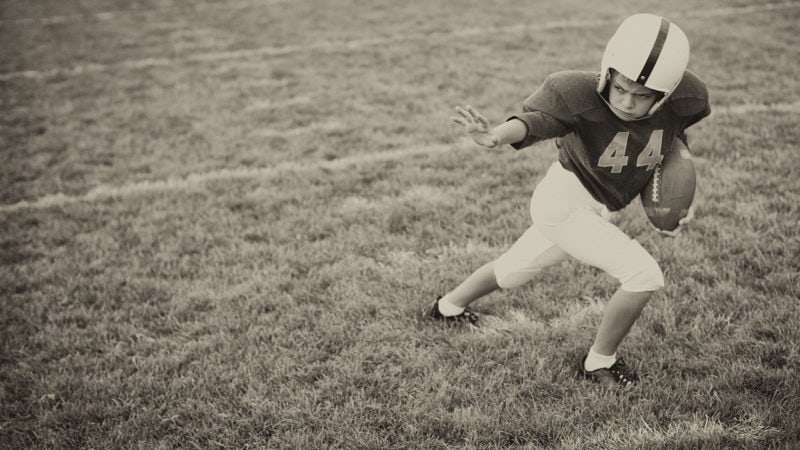 football playing kid