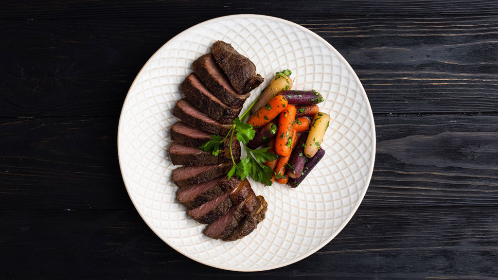 montreal steak with carrots