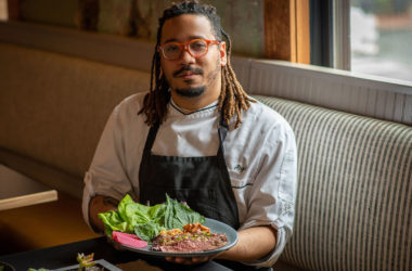 angel barreto of anju with his flank steak ssam board