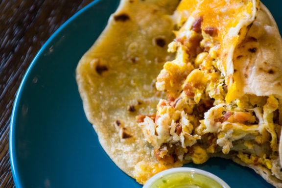breakfast burrito eggs and cheese on plate