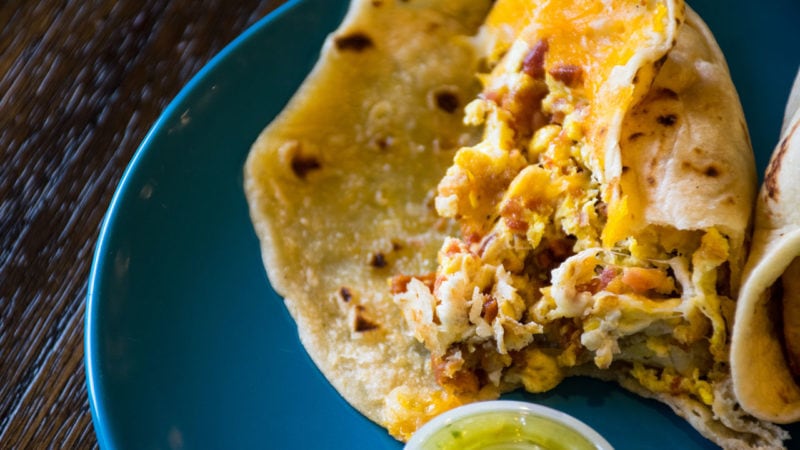 breakfast burrito eggs and cheese on plate