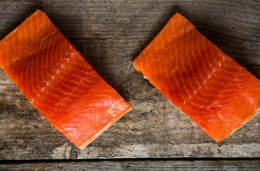 raw salmon on a wooden table