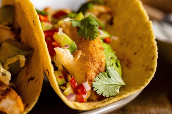 cod tacos with spicy crema and slaw