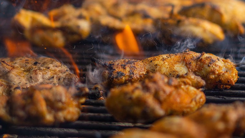 grilled chicken thighs on grill