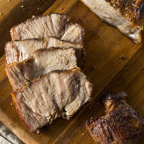 roast pork butt on cutting block