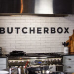 Kitchen image with a ButcherBox sign.