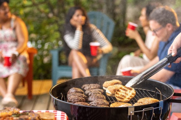 burgers and buns on grill