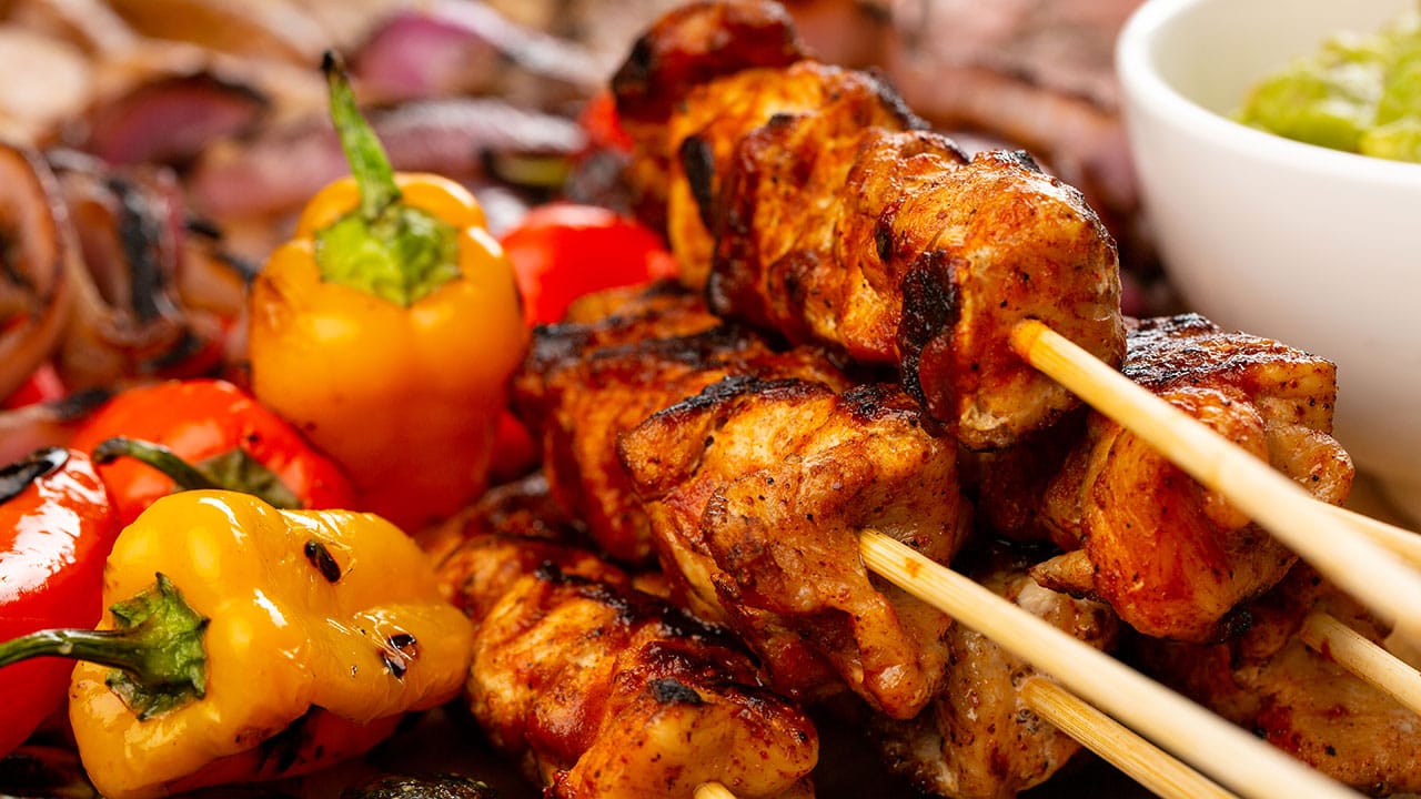 BBQ pork skewers with charred peppers