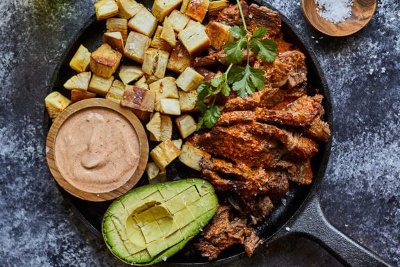 adobo roast beef with yucca and chipotle cream