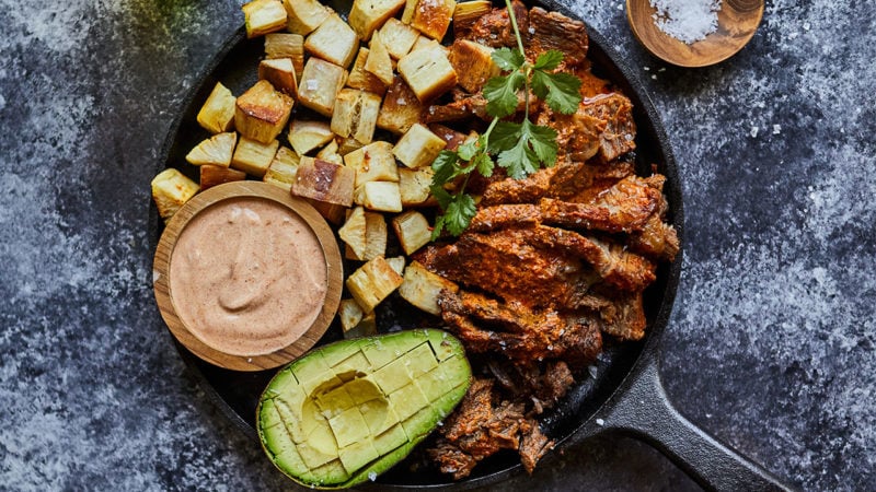 adobo roast beef with yucca and chipotle cream