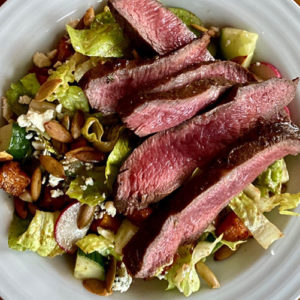 steak salad with chili roasted squash