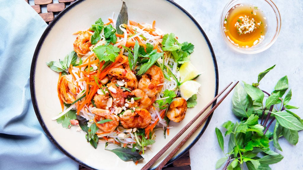 garlic sriracha shrimp with noodles or salad