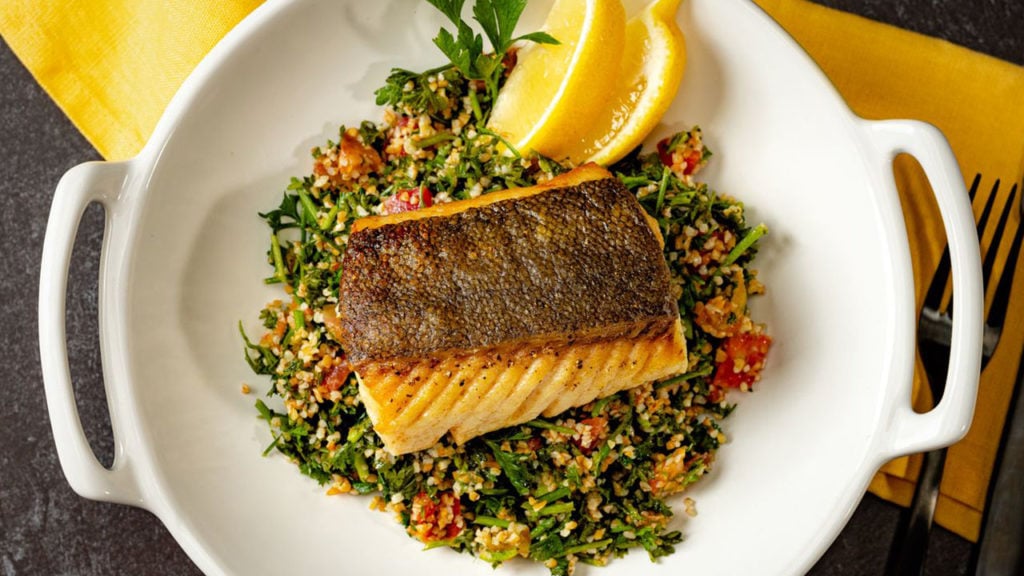 sablefish on a plate with lemon