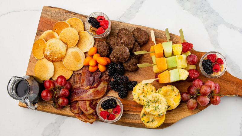 brunch with pancakes sausage eggs and bacon