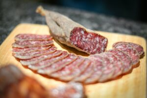 cured sausage cut into slices