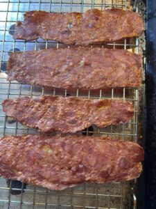 Turkey bacon on a cooling rack