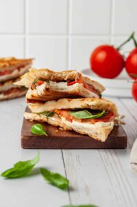 caprese panini on a chopping block
